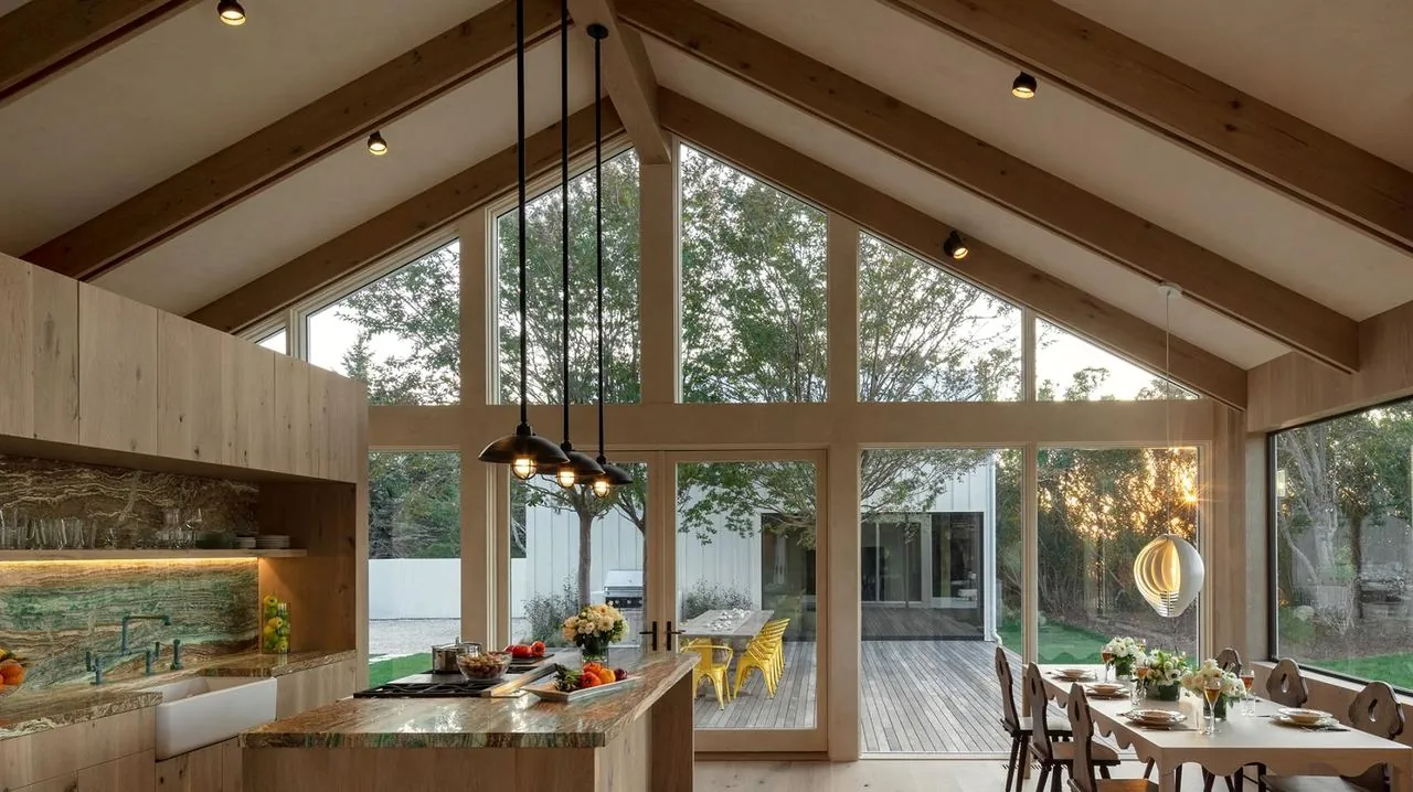 Vaulted great room with layered architectural lighting
